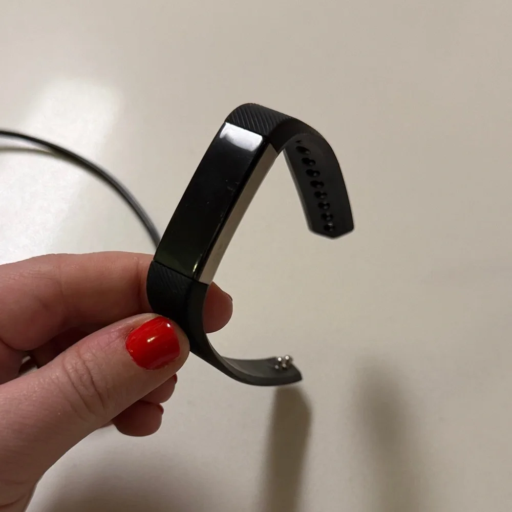 Black Fitbit Alpha Fitness Tracker